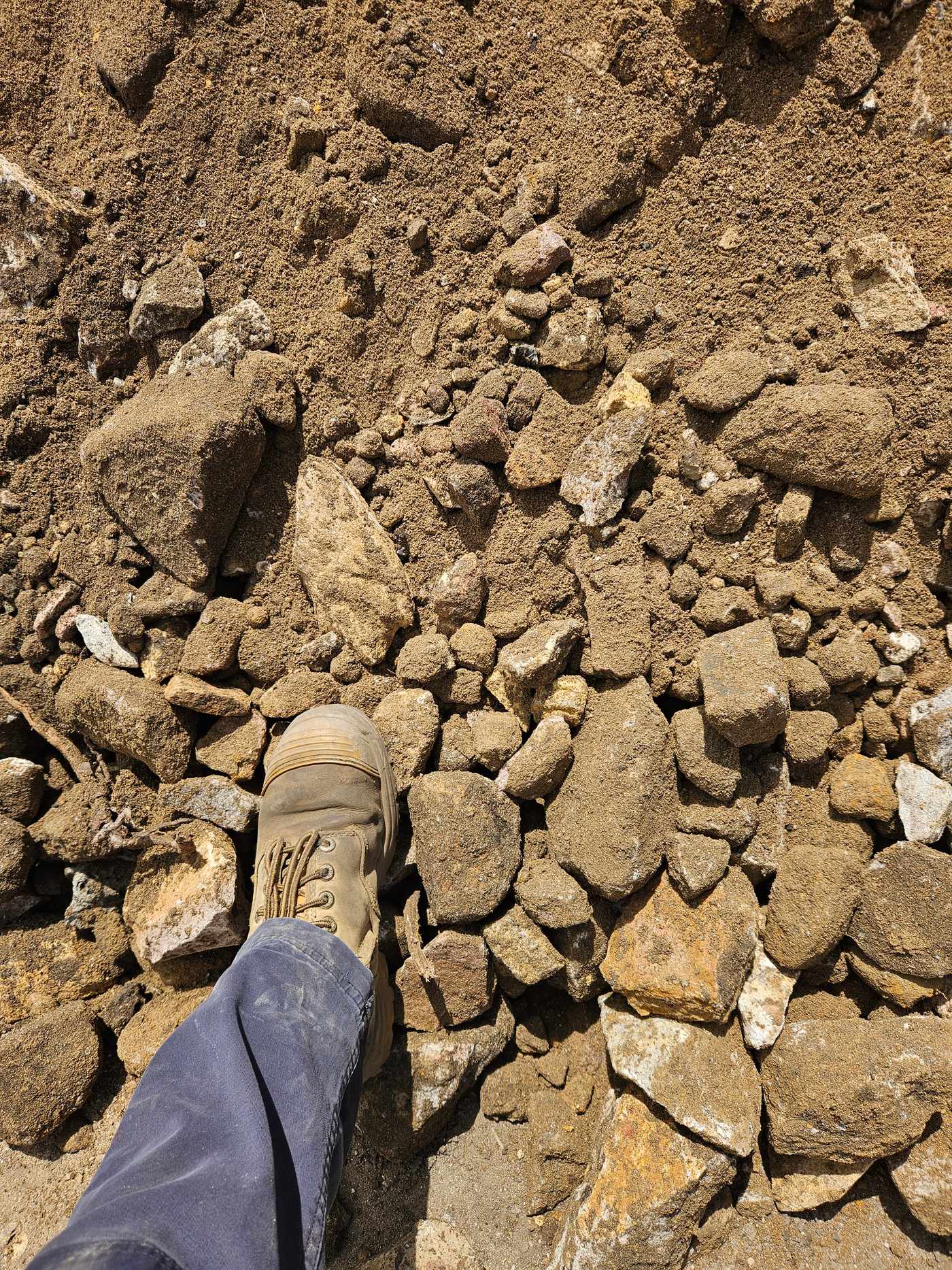 Mobile crusher processing material on a Gold Coast site